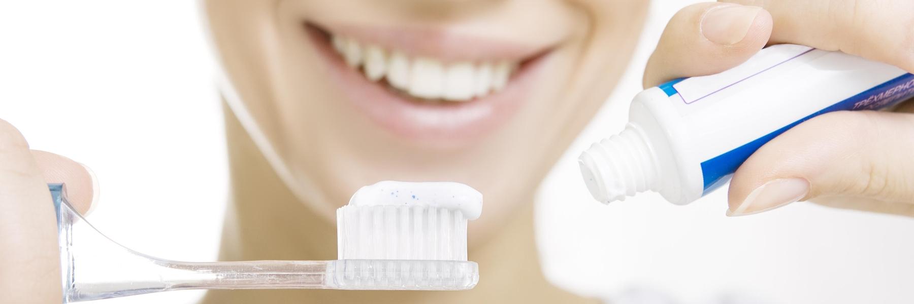 Woman brushing teeth | Dentist Clinton Township