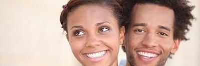 young couple smiling l clinton township dentist